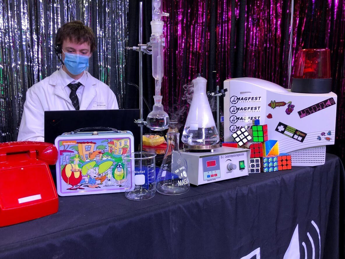 Event host dressed as a scientist in a lab